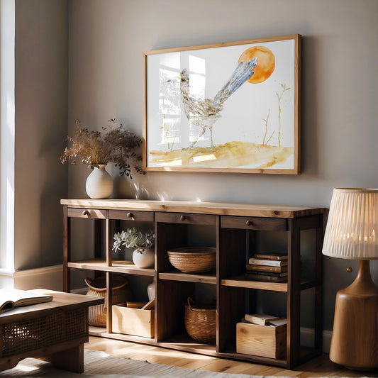 Original watercolor painting of a roadrunner beneath a golden sun by Chloe Duncan, desert inspired fine art