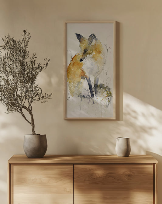 Watercolor painting of a peaceful fox sitting with eyes closed, surrounded by tall grasses. Soft, warm tones evoke stillness and quiet observation. Created by Scottish artist Chloe Duncan, known for her folklore inspired animal art